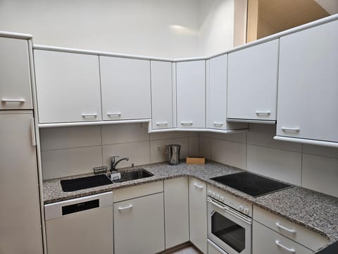 Kitchen or kitchenette, dishwasher, oven, toaster