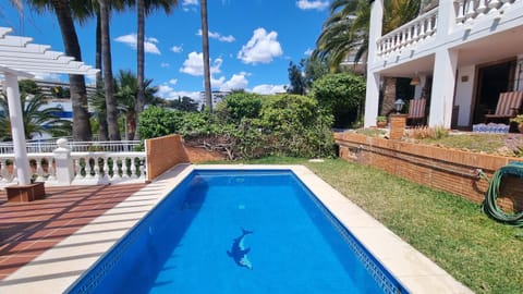 Property building, Living room, Swimming pool