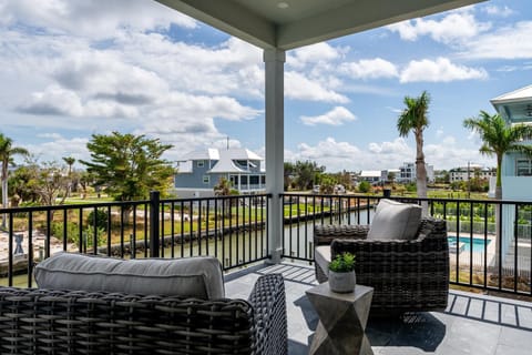 Canal-Front Luxury: Pool, Spa & Steps to Beach House in Estero Island