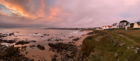 Property building, Nearby landmark, Natural landscape, Beach, Sea view, Sunset