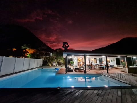 Property building, Night, View (from property/room), Pool view, Swimming pool