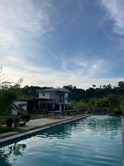 Property building, Day, Natural landscape, Pool view, Swimming pool