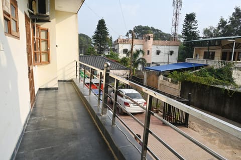 Property building, Day, View (from property/room), Balcony/Terrace, Street view, Parking