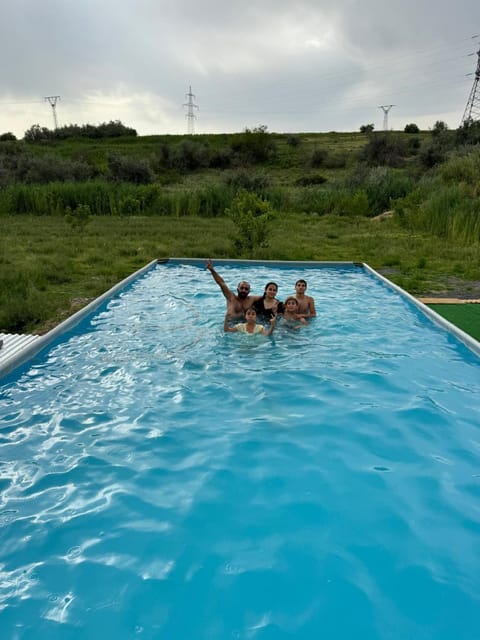 People, Natural landscape, Pool view, Swimming pool, group of guests