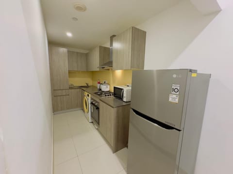 Kitchen or kitchenette, dishwasher, minibar, oven, stove, toaster