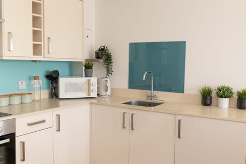 Kitchen or kitchenette, microwave