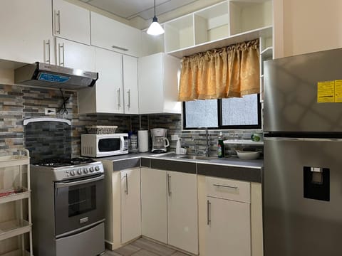 Kitchen or kitchenette, oven