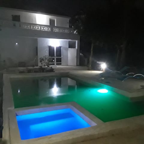 Night, Pool view, Swimming pool, sunbed