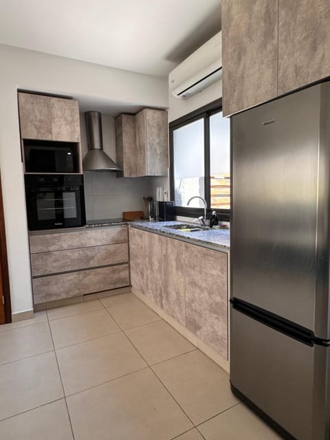 Kitchen or kitchenette, oven