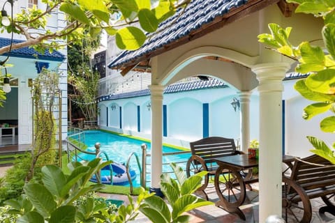 Property building, Patio, Day, Garden, View (from property/room), Balcony/Terrace, Garden view, Pool view, Swimming pool, sunbed