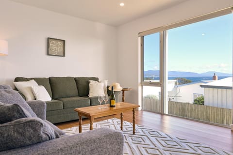 View (from property/room), Living room, Seating area, Mountain view, Sea view