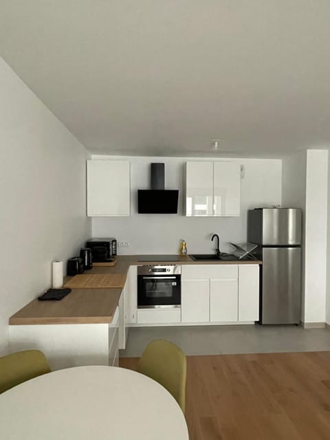 Kitchen or kitchenette, oven, stove, toaster