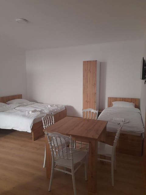 Bed, Dining area, Bedroom, towels, wardrobe