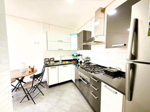 Dining area, dishwasher, oven, stove, toaster