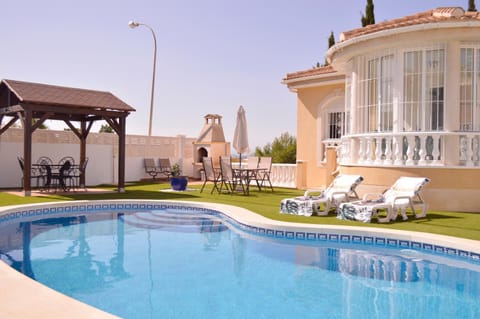 Property building, Day, Pool view, Swimming pool, sunbed