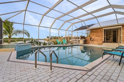 Pool, Canal Views, Sleeps 10-Villa Surfside Breeze- Roelens Vacations House in Cape Coral