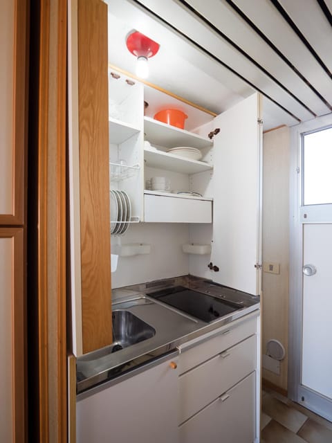 Kitchen or kitchenette, stove