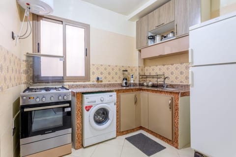 Kitchen or kitchenette, washing machine