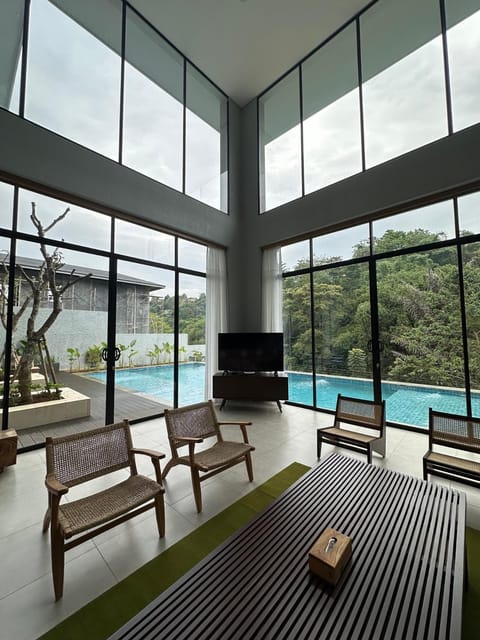 Natural landscape, TV and multimedia, Living room, Seating area, Swimming pool