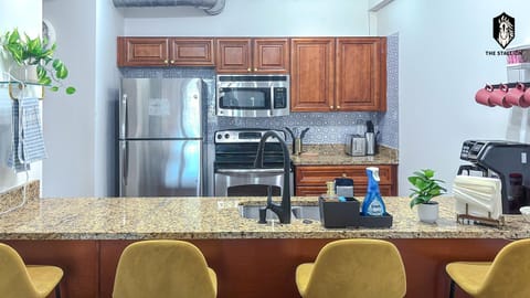 Kitchen or kitchenette, Dining area, dishwasher, oven, stove, toaster