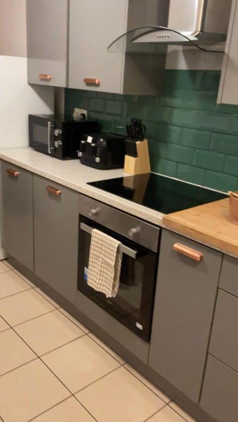 Kitchen or kitchenette, oven, stove