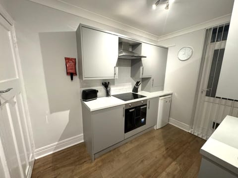 Kitchen or kitchenette, oven, stove