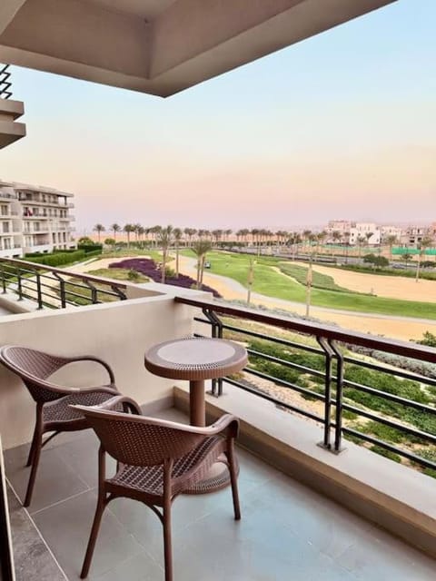 Golf view & Terrace at UptownCairo Apartment in Cairo