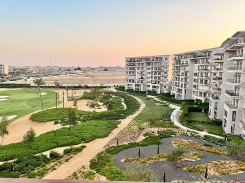 Golf view & Terrace at UptownCairo Apartment in Cairo