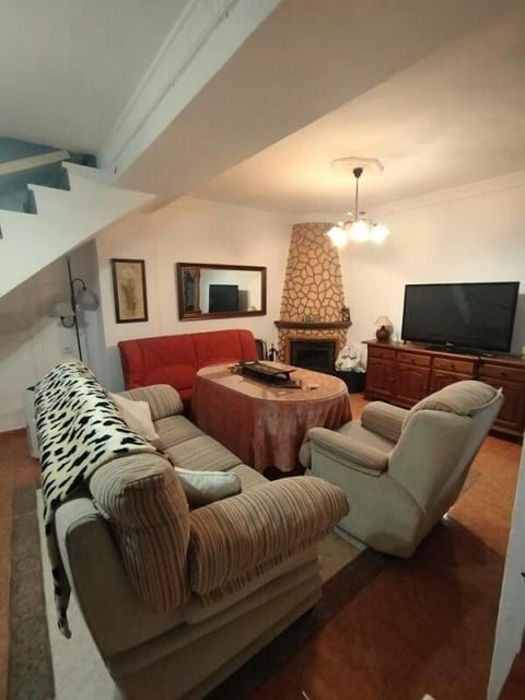 TV and multimedia, Living room, Seating area, fireplace, furniture, heating, storage