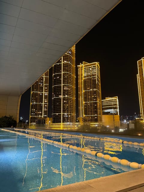 Property building, Night, City view, Pool view, Swimming pool