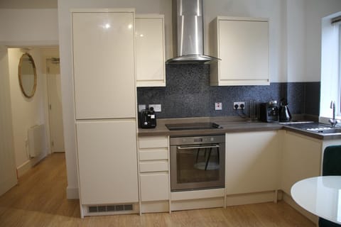 Kitchen or kitchenette, oven, stove