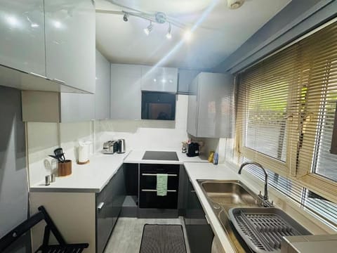 Kitchen or kitchenette, oven, stove