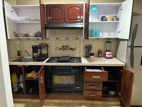 Kitchen or kitchenette, stove