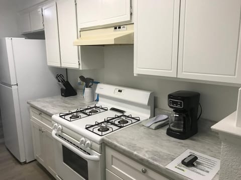 Kitchen or kitchenette, stove