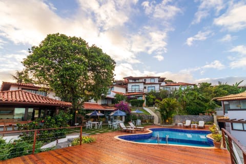 Property building, Day, Pool view, Swimming pool, sunbed