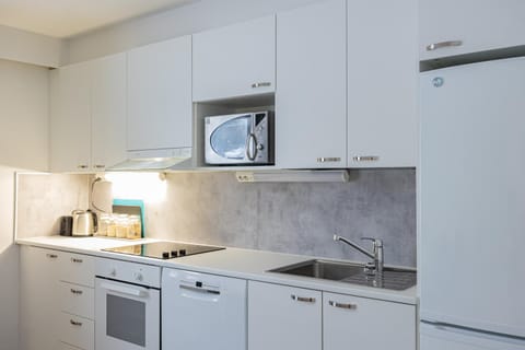 Kitchen or kitchenette, stove