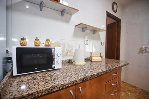 Kitchen or kitchenette, oven, stove