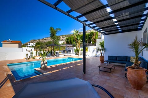 Patio, Seating area, Pool view, Swimming pool, sunbed