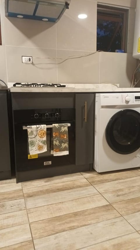 Kitchen or kitchenette, washing machine, dryer