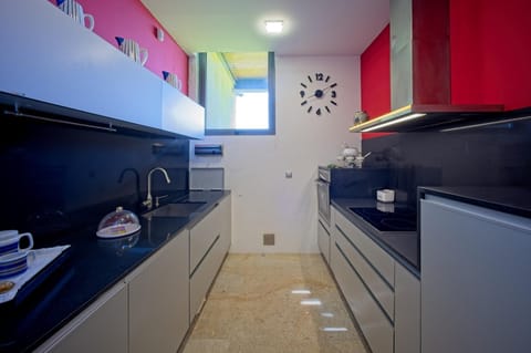 Kitchen or kitchenette, oven, stove