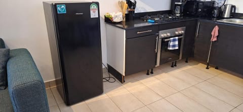 Kitchen or kitchenette, oven, stove