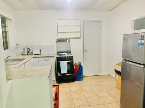 Kitchen or kitchenette, oven, stove