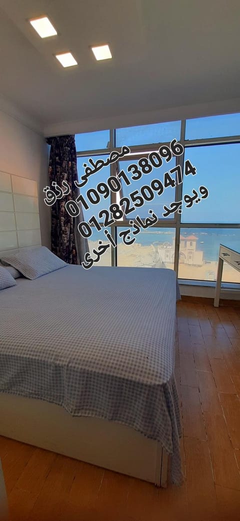 Bed, View (from property/room), Photo of the whole room, Beach, Sea view