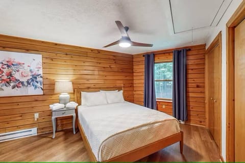 Hexagonal log cabin in woods House in Deep Creek Lake