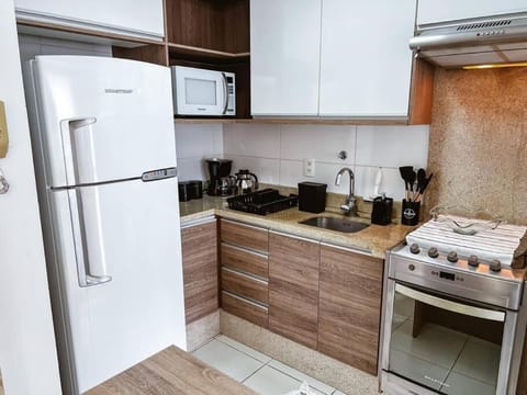 Kitchen or kitchenette, oven, stove