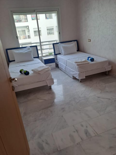 Appartement en face de la plage avec piscine Apartment in Rabat-Salé-Kénitra