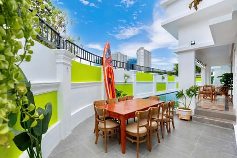 Property building, Patio, Day, View (from property/room), Balcony/Terrace, Living room, Seating area, Dining area, Pool view, Swimming pool, sunbed