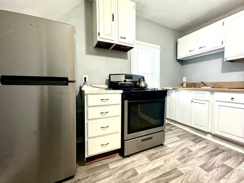 Kitchen or kitchenette, oven