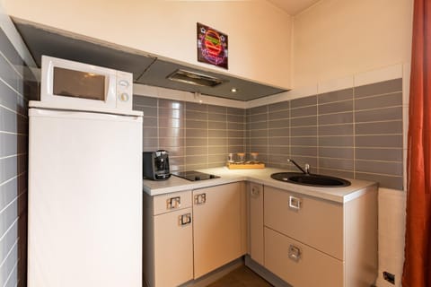 Kitchen or kitchenette, stove