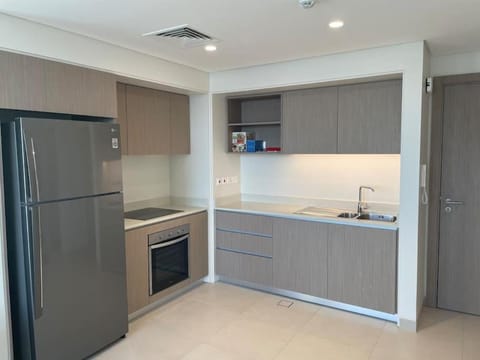 Kitchen or kitchenette, oven, stove